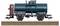 Zelený model nákladního vozu Deutsche Bahn na kolejích, označený štítkem 'DB 580 517' a 'Berlin Betriebsstoffwagen Hamburg'.