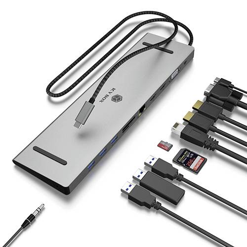 Multifunkční adaptér s USB-C připojením; nabízí HDMI, USB, čtečku SD karet a audioport. Ideální pro notebooky.