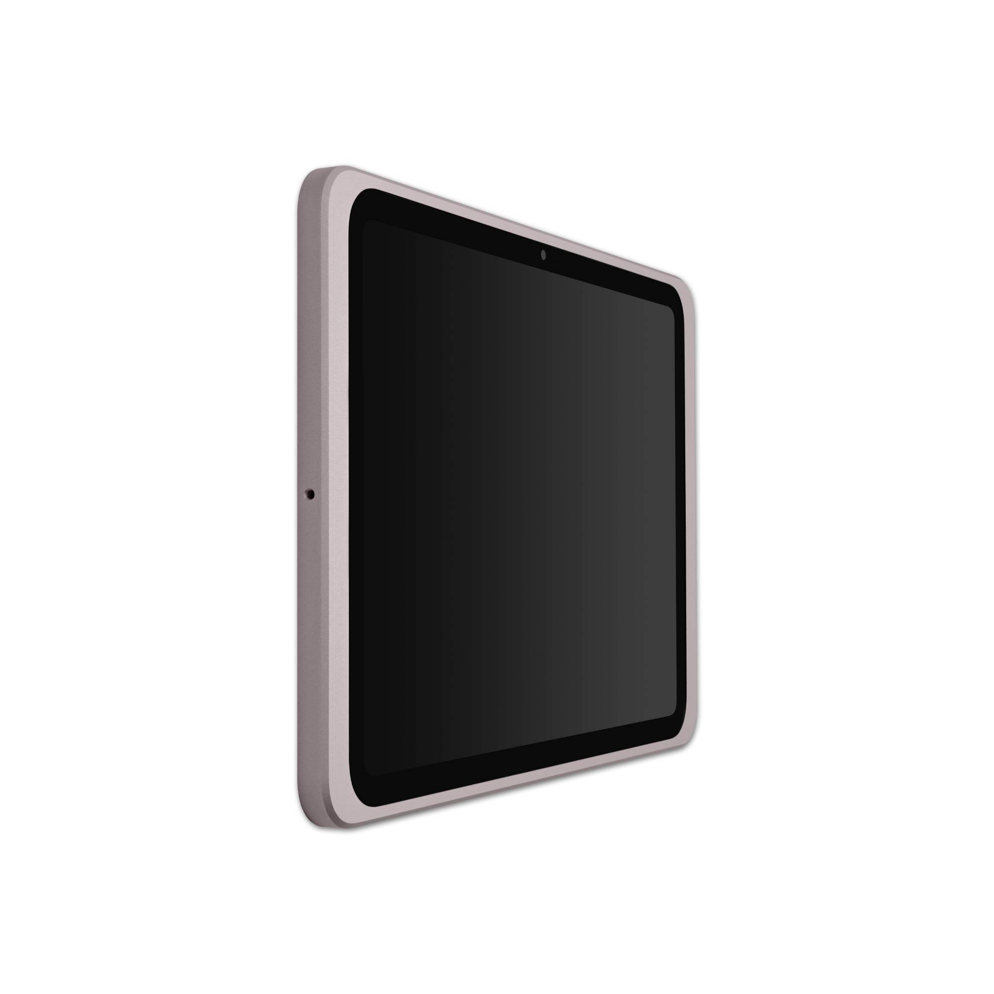 Tablet s černou obrazovkou ve stříbrném rámu, pohled z boku shora.