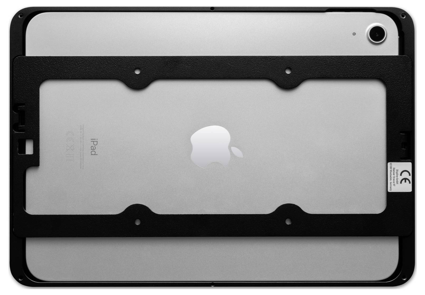 Šedý zadní kryt iPadu s logem Apple uprostřed, obklopený černým rámovým systémem.