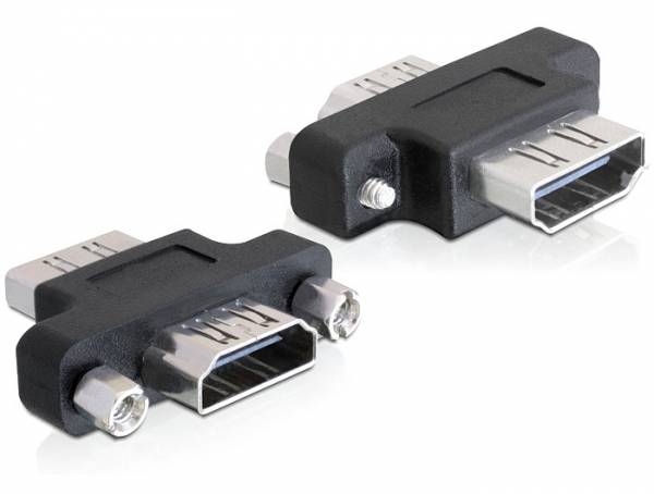 Černý HDMI adaptér se dvěma konektory, který propojuje samičí a samčí HDMI kabely, umístěný na bílém pozadí.