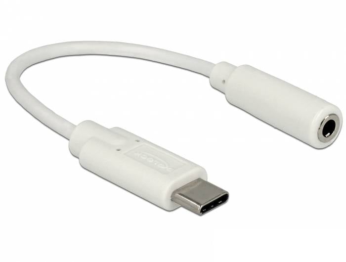 Bílý USB-C adaptér na jack, který umožňuje připojit analogové sluchátka k zařízením bez klasického sluchátkového výstupu.