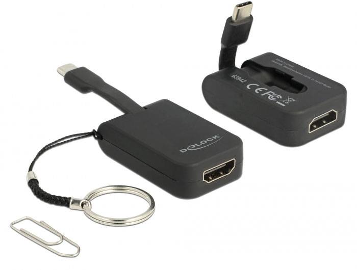USB-C na HDMI adaptér s poutkem a kroužkem na klíče, vhodný pro připojení zařízení s USB-C k monitoru s rozhraním HDMI.