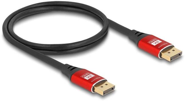 Černý HDMI kabel s červenými konektory, používaný k přenosu audio a video signálů mezi zařízeními, jako jsou počítače a televize.