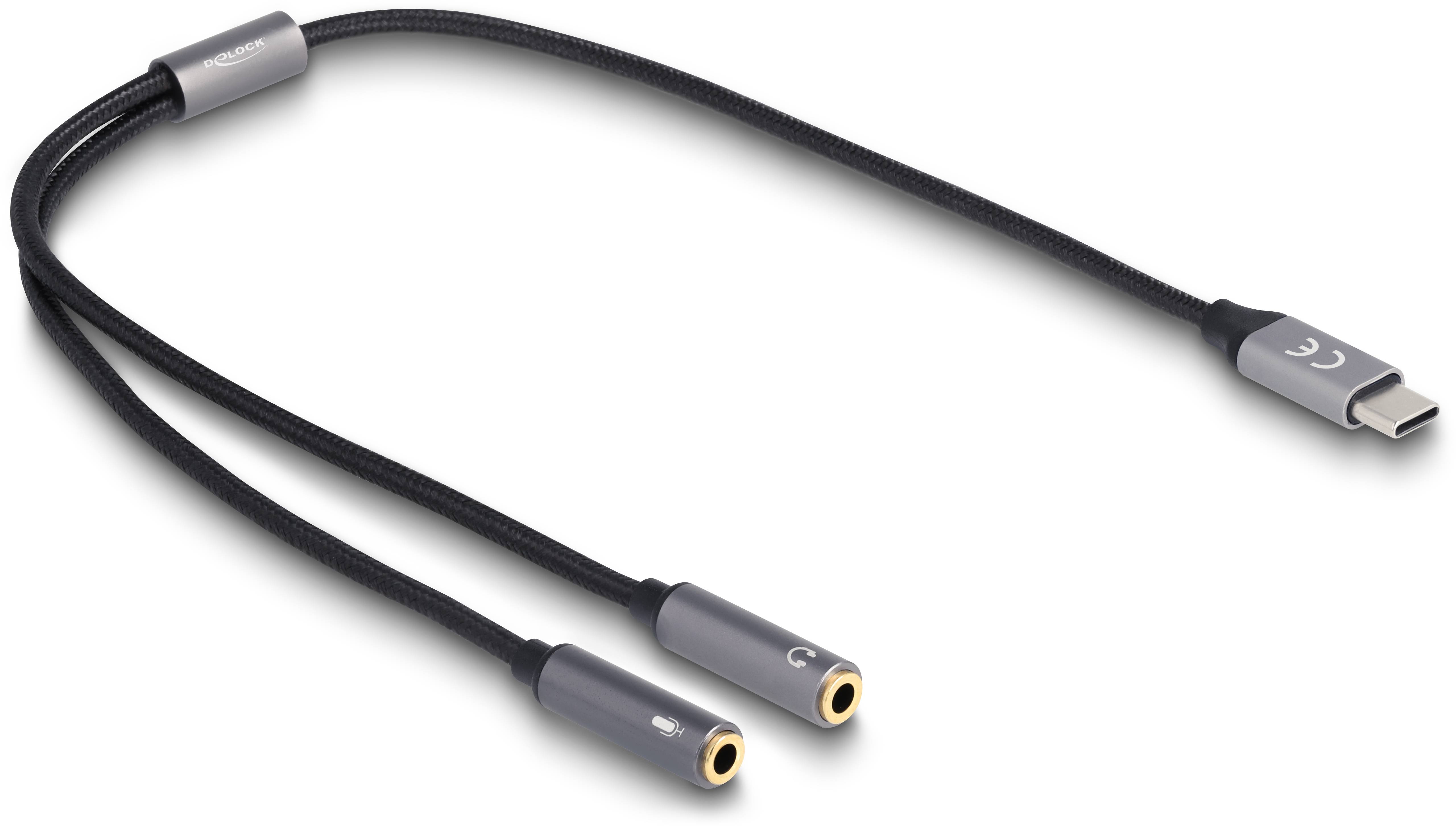 USB-C audio adaptérový kabel se dvěma sluchátkovými konektory, který umožňuje připojit dvě audiozařízení současně k jednomu zařízení.