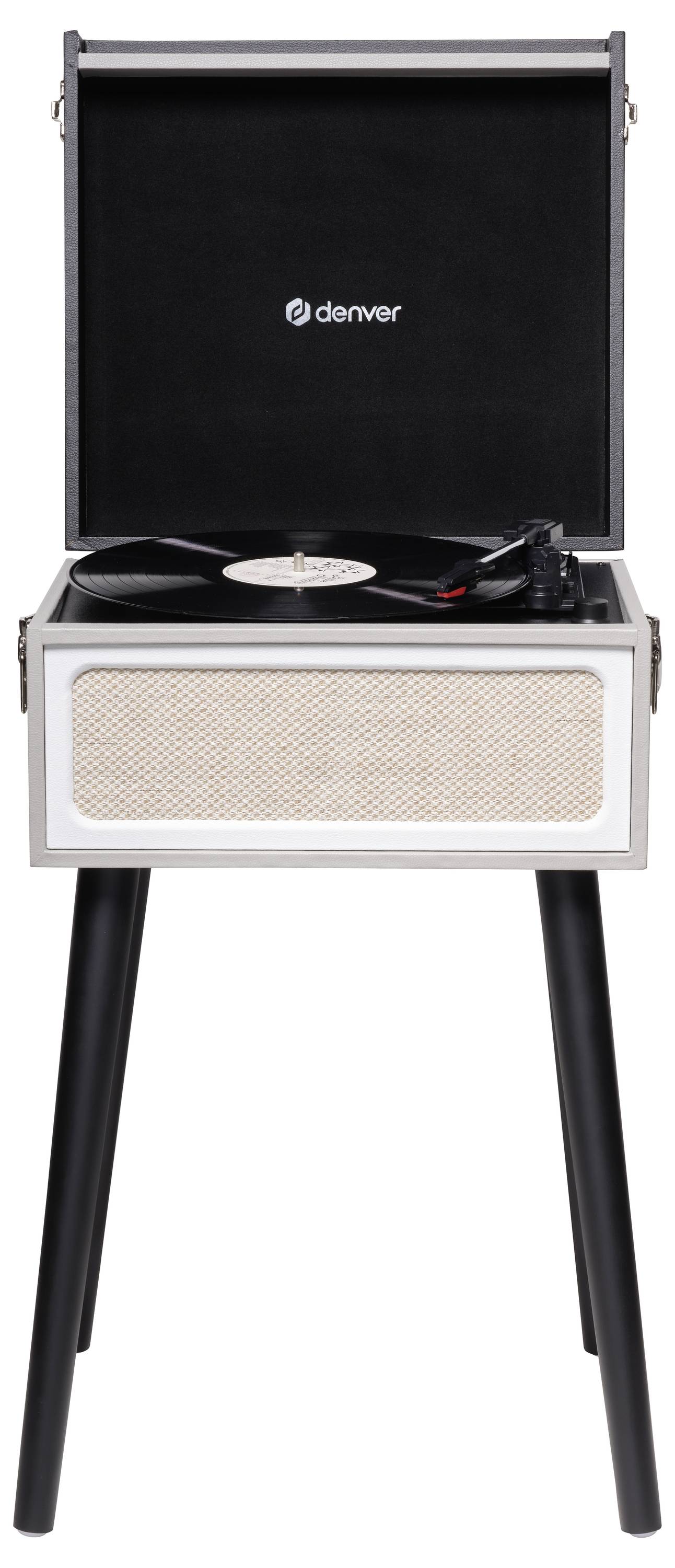 Gramofon v dřevěné skříňce s otevřeným víkem, stojící na čtyřech nohách. Na něm je přehrávána vinylová gramofonová deska.