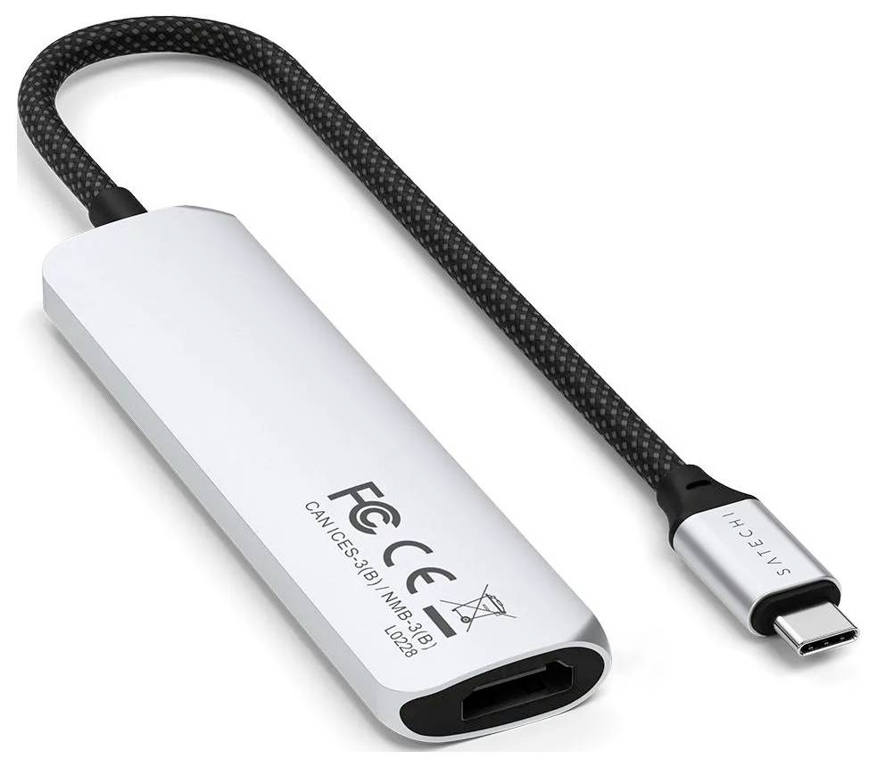 USB-C na HDMI adaptér s textilním kabelem, stříbrné pouzdro. Název značky a technické symboly na povrchu.
