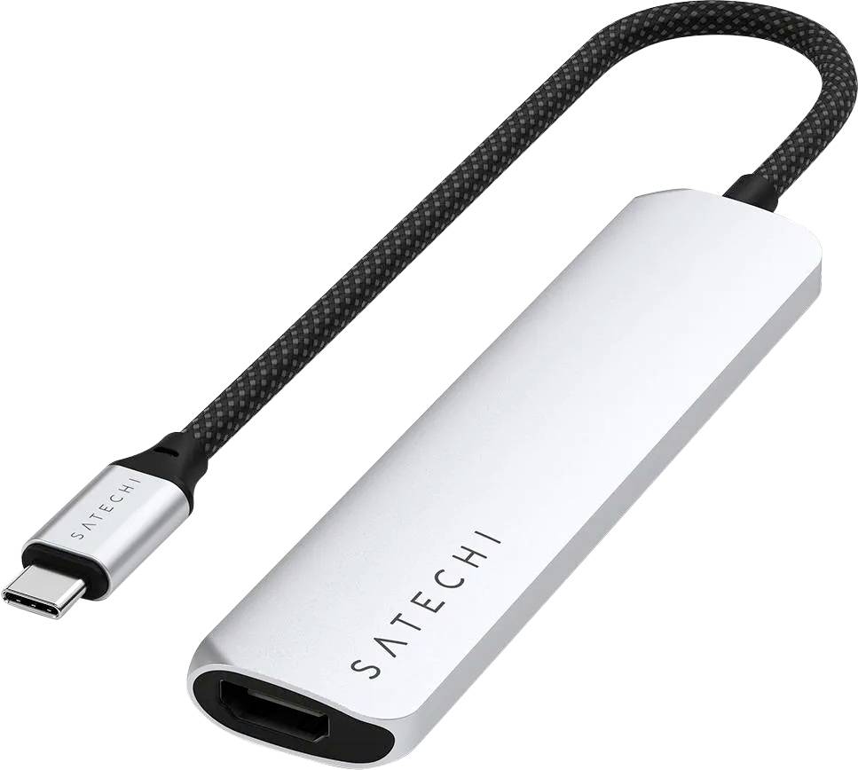 Stříbrný adaptér od Satechi s konektorem USB-C a HDMI výstupem pro připojení zařízení k monitorům.