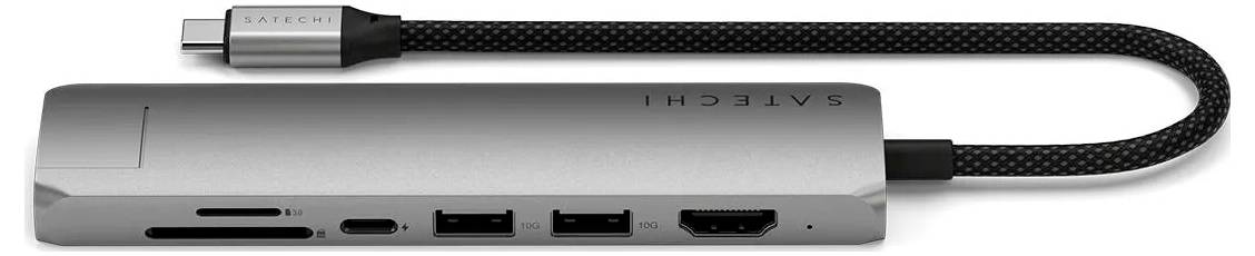 Kovový USB-C hub s několika porty, včetně HDMI, USB-A a čtečky SD karet.