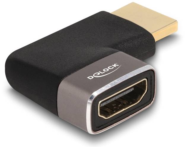 Černý HDMI adaptér od Delocku s samčím a samičím konektorem, umožňuje propojení mezi HDMI zařízeními.