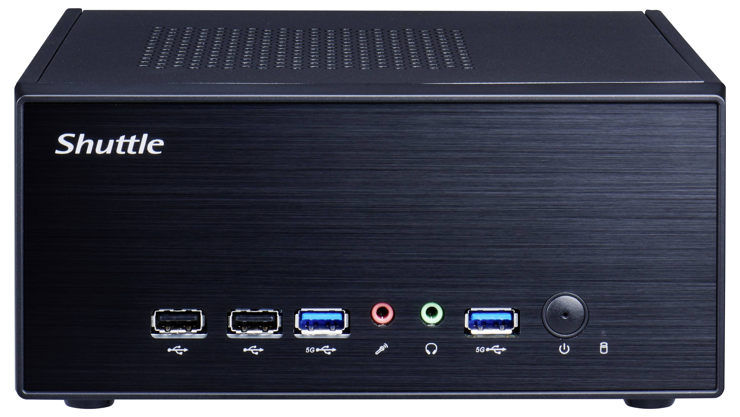 Malý černý stolní počítač s nápisem 'Shuttle' na přední straně, s několika USB porty a audio konektory.