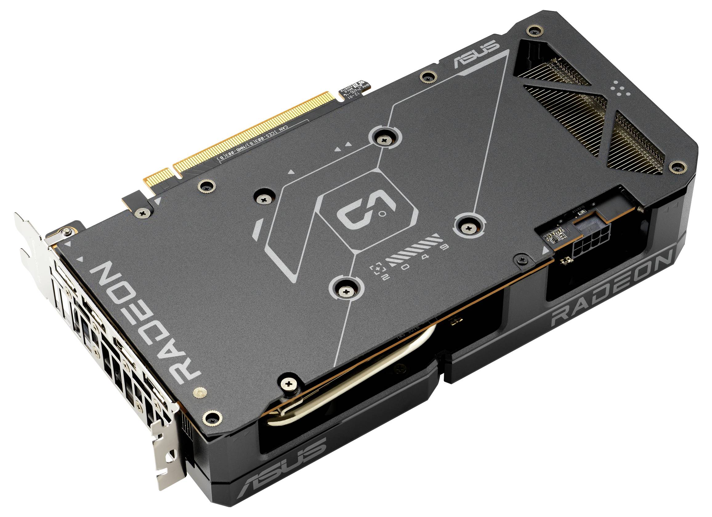 Černá grafická karta ASUS Radeon s komplexním designem obvodů, několika chladicími otvory a elektrickými konektory.