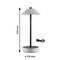 Stolní lampa s kuželovitým stínidlem, výška 330 mm, průměr 150 mm. Stojí na kulatém podstavci, černý kabel leží vedle.