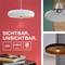 Reklama na LED žárovky: moderní, ploché, s paticí E27. Prezentuje elegantní závěsná svítidla před červeným pozadím. Text: Viditelné. Neviditelné.