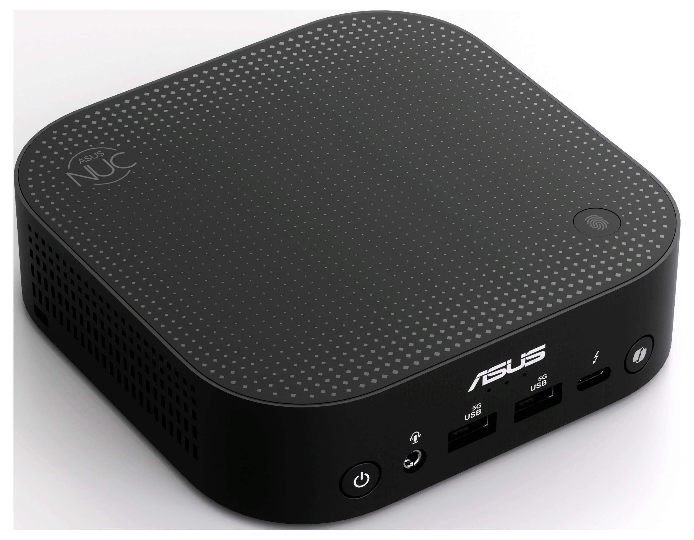 Kompaktní černý mini počítač s USB porty a audio zdířkou na přední straně. Logo značky 'Asus' je viditelné.