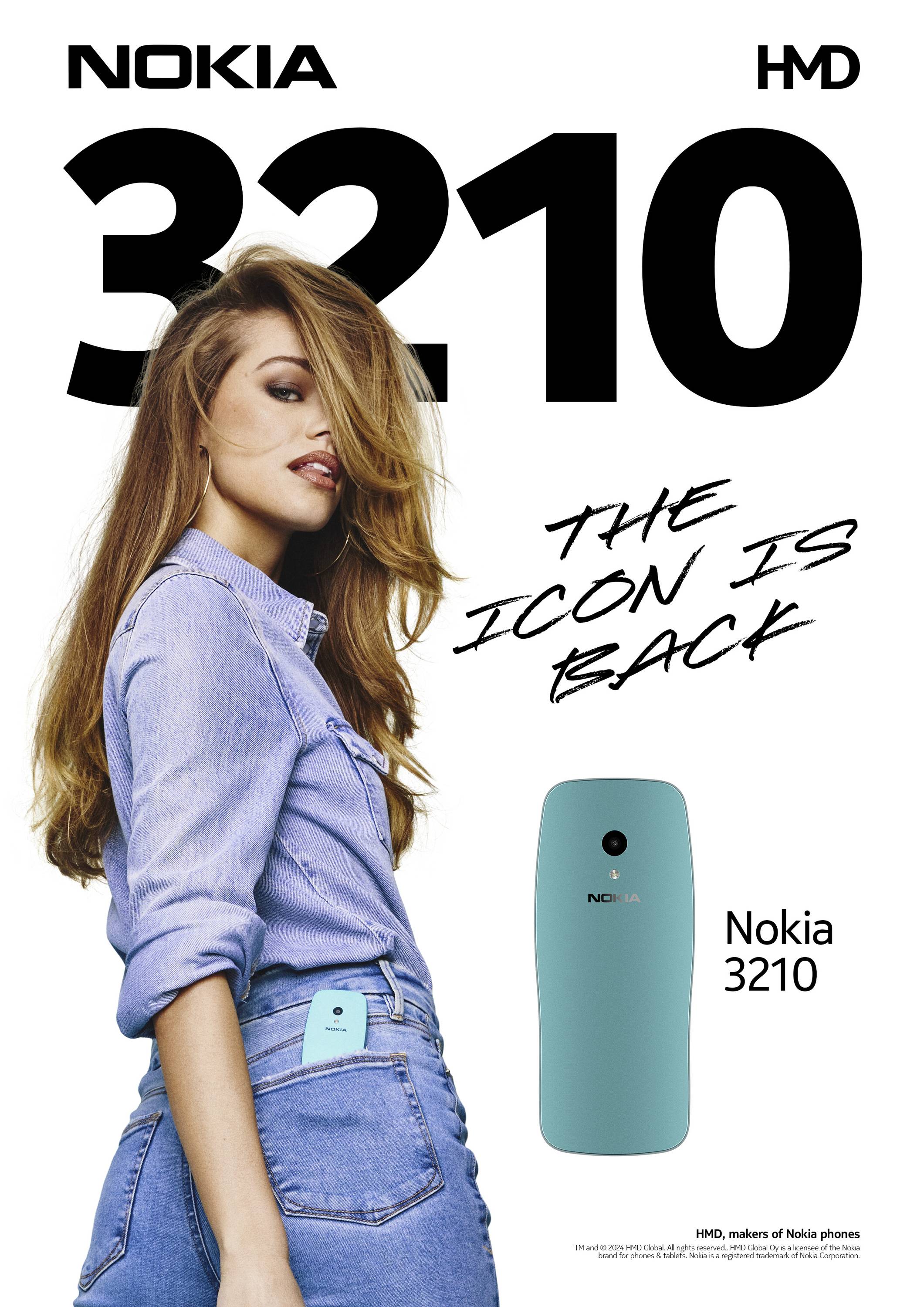 Žena v džínové košili si vkládá mobilní telefon Nokia 3210 do zadní kapsy. Text: 'Ikona se vrací'.