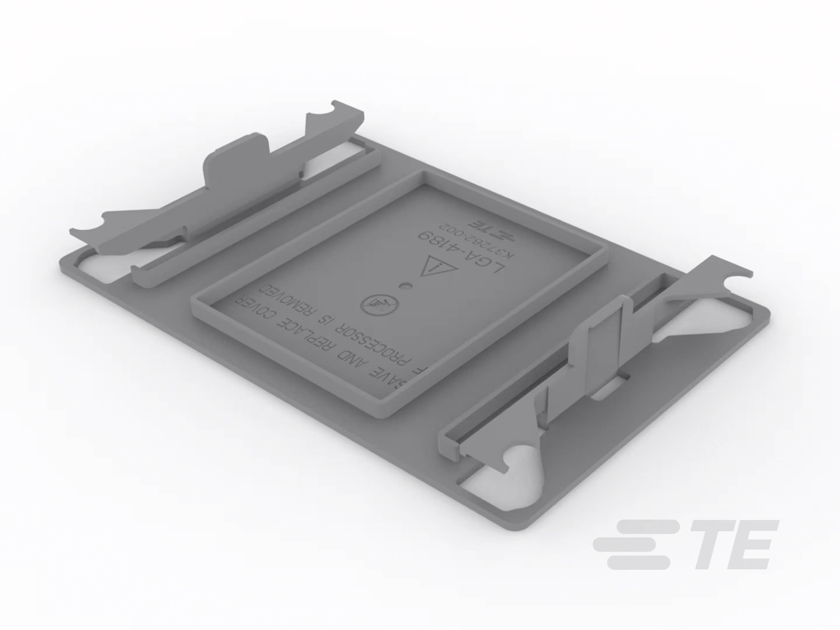 Šedý vložný díl držáku RFID karty s logem TE. Vhodný pro uchycení a zabezpečení karet v elektronických aplikacích.