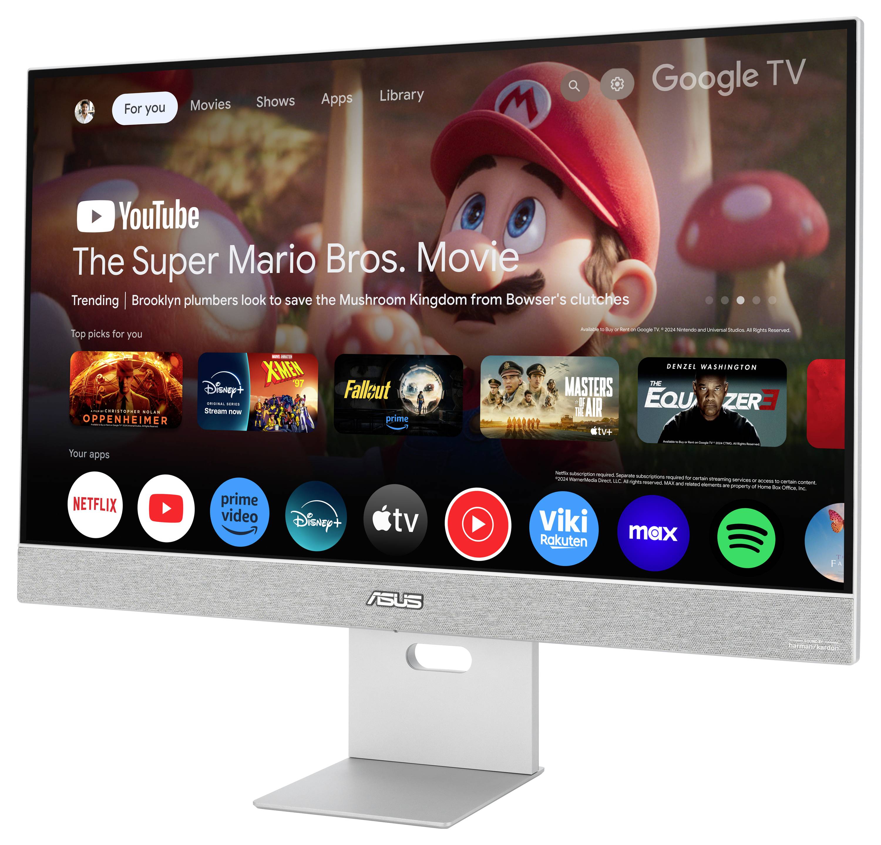Počítačový monitor zobrazuje uživatelské rozhraní Google TV. Uprostřed je zvýrazněn film 'The Super Mario Bros. Movie'.