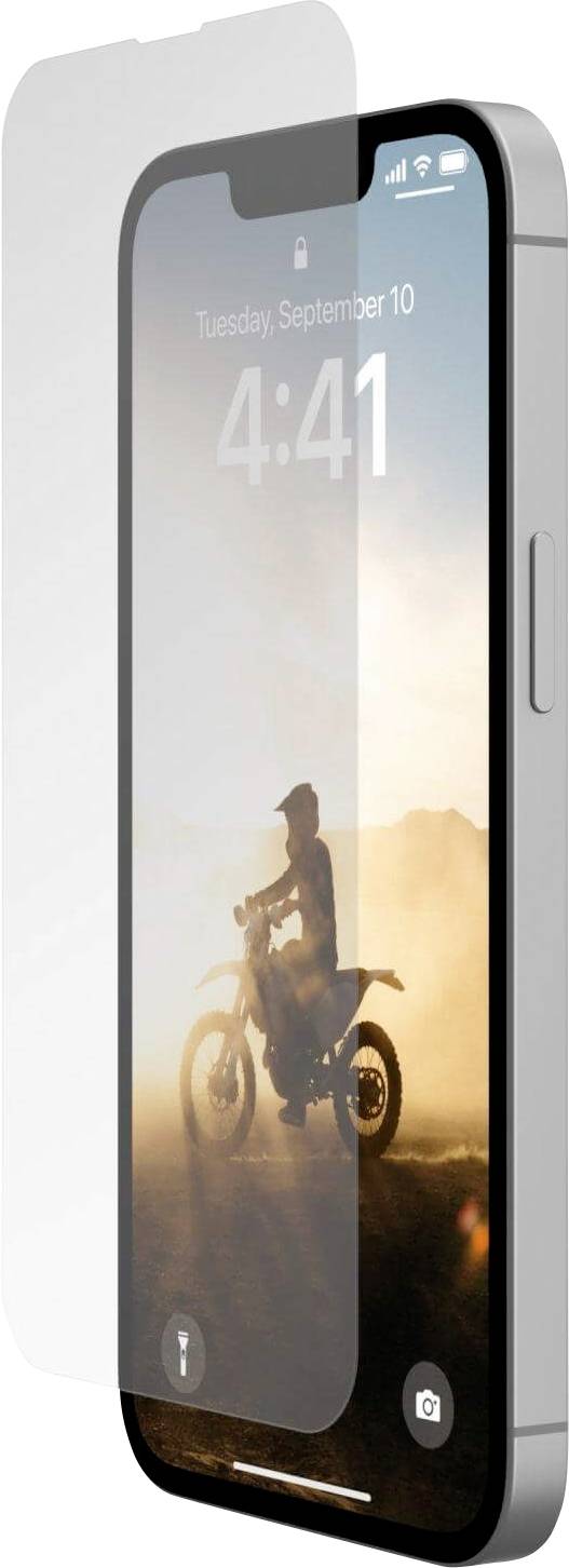 Ochranná fólie na displeji smartphonu; tapeta zobrazuje osobu na motorce za soumraku.