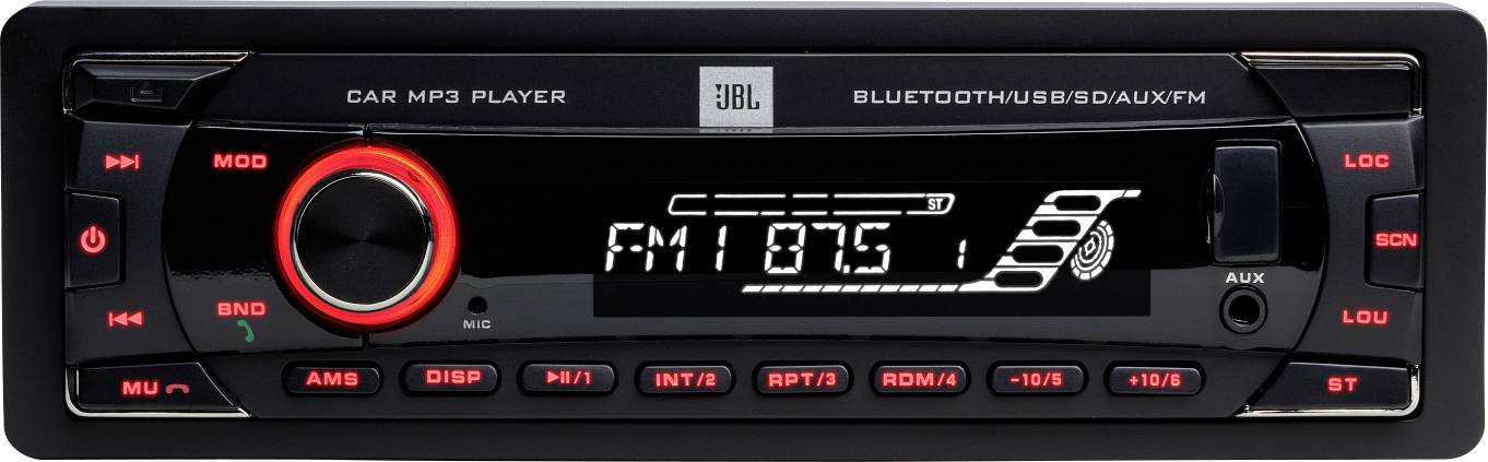 Autorádio čelní pohled s bluetooth, USB a AUX vstupy. Display ukazuje 'FM1 87.5'. Viditelné tlačítka pro výběr módu, hlasitost a ladění stanic.