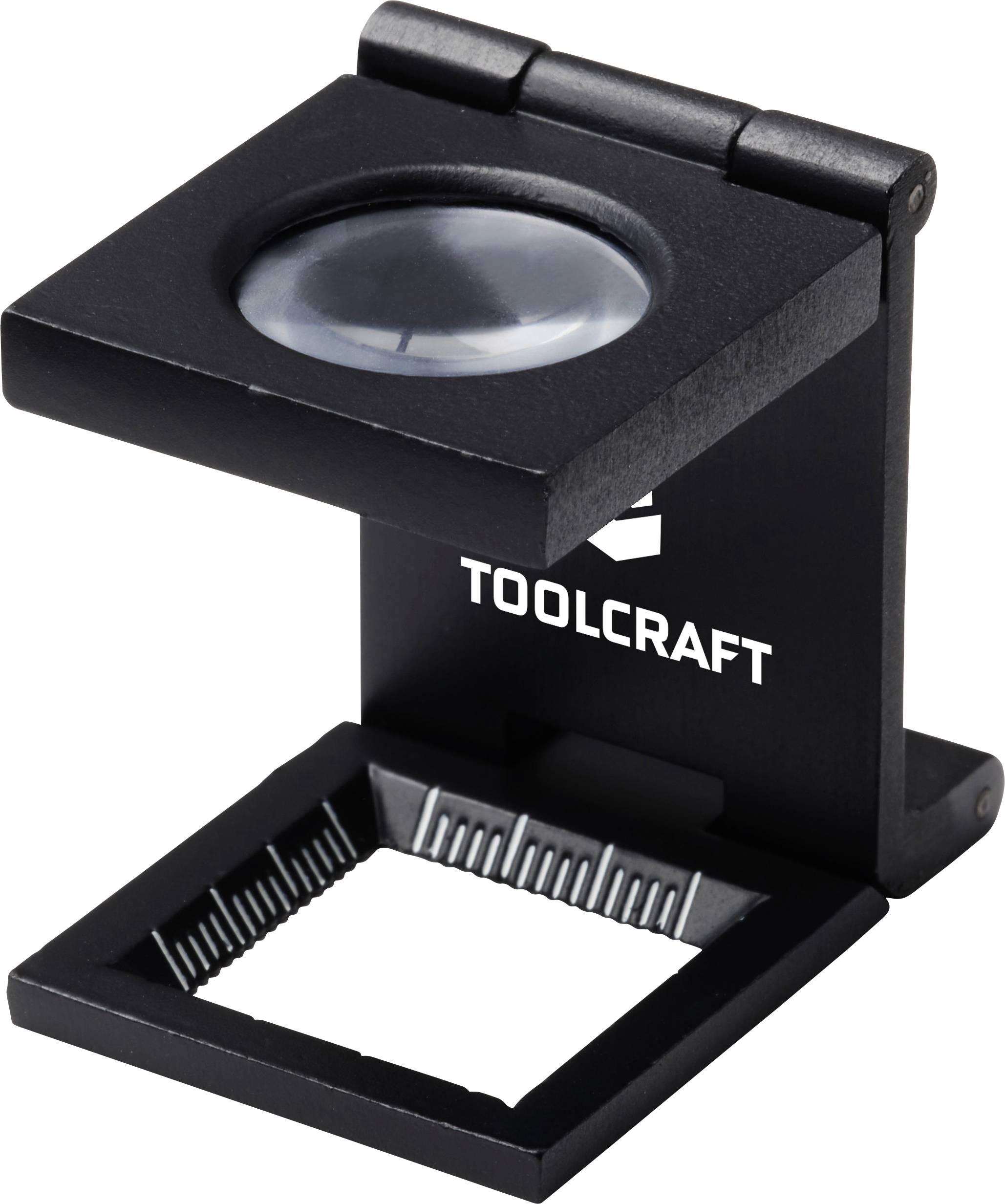 Skládací lupa s značkou "Toolcraft" s obdélníkovou základnou a kulatou čočkou na černém stojanu, určená pro detailní inspekci.