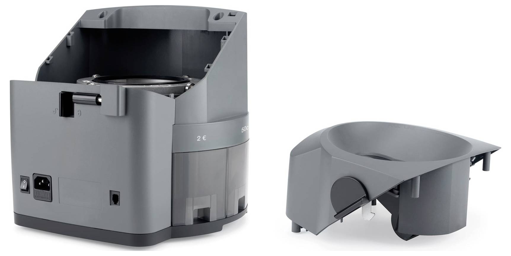 Elektronické zařízení v šedé barvě, sestávající ze dvou částí. Vlevo hlavní zařízení s tlačítky a konektory. Vpravo odpojitelný modul.