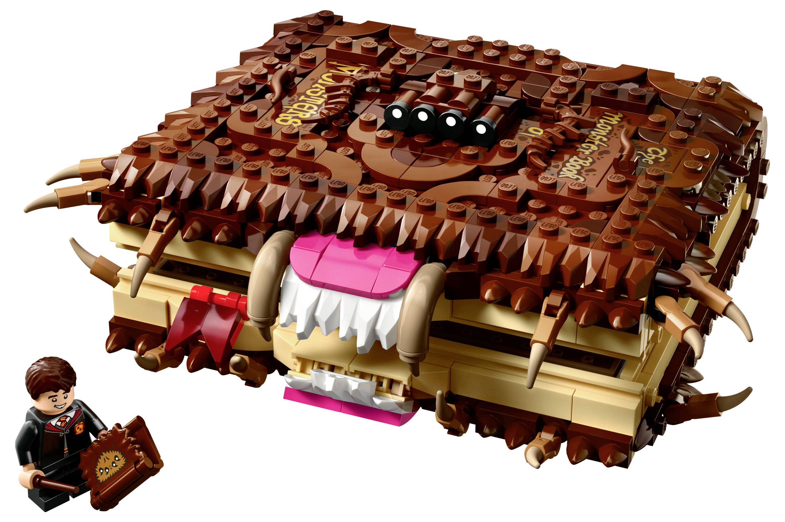LEGO model 'Knihy monster' s figurkou čaroděje. Kniha má zuby, jazyk a dekorativní detaily.
