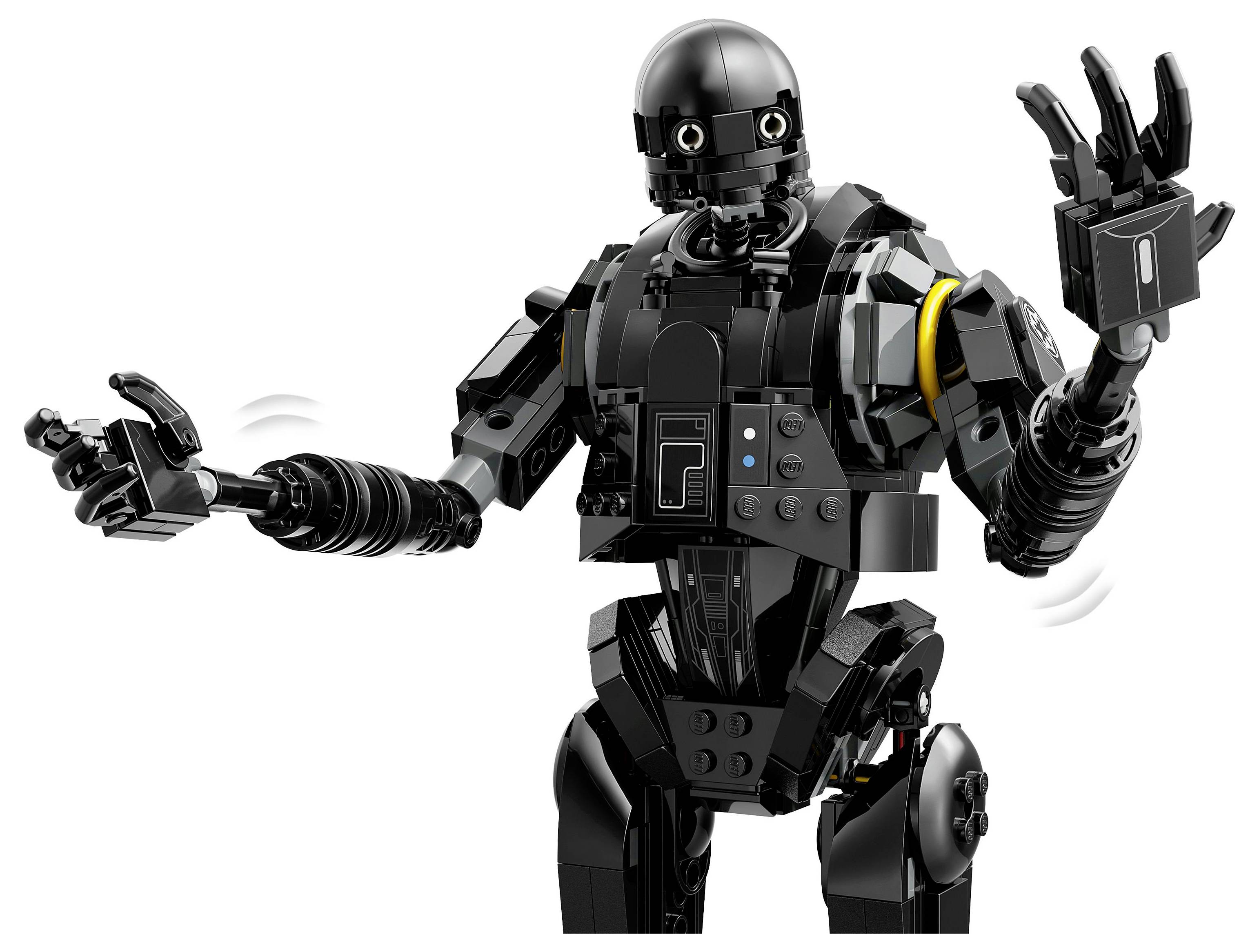 Černý humanoidní robotický model s kloubnatýma pažema zvednutýma, zobrazující gesto pohybu. Robot má válcovitou hlavu a detailní mechanické součásti.