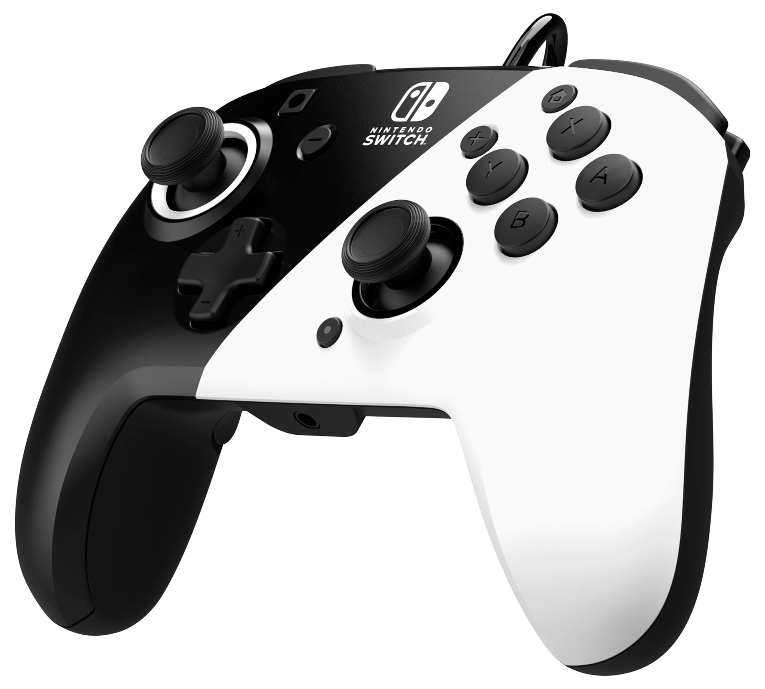Černobílý Nintendo Switch Pro Controller s tlačítky a analogovými pákami, ležící na bílém povrchu.