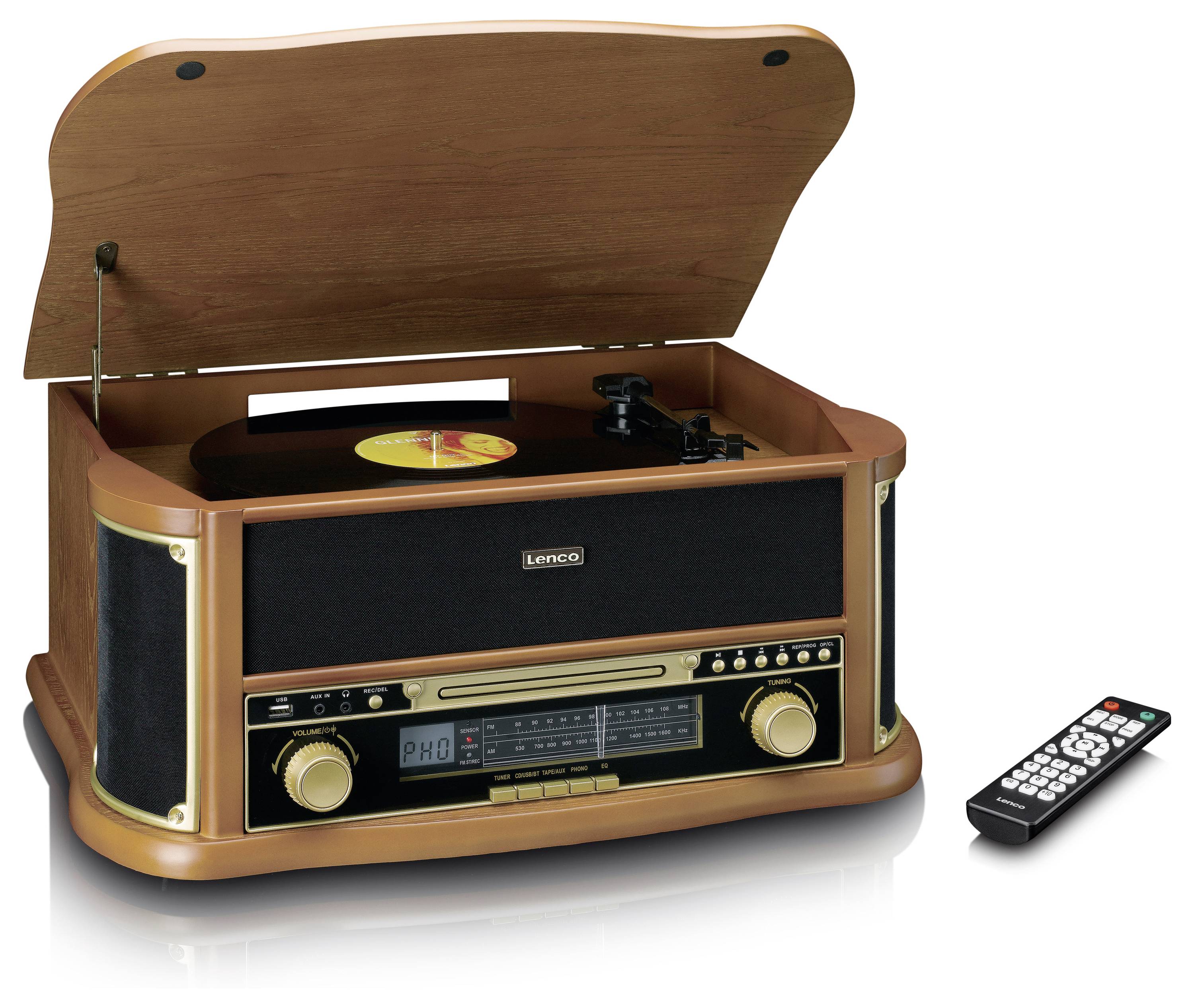 Retro dřevěný gramofon s otevřeným víkem. Vedle něj leží dálkový ovladač. Zařízení s reproduktory a ovládacími prvky.