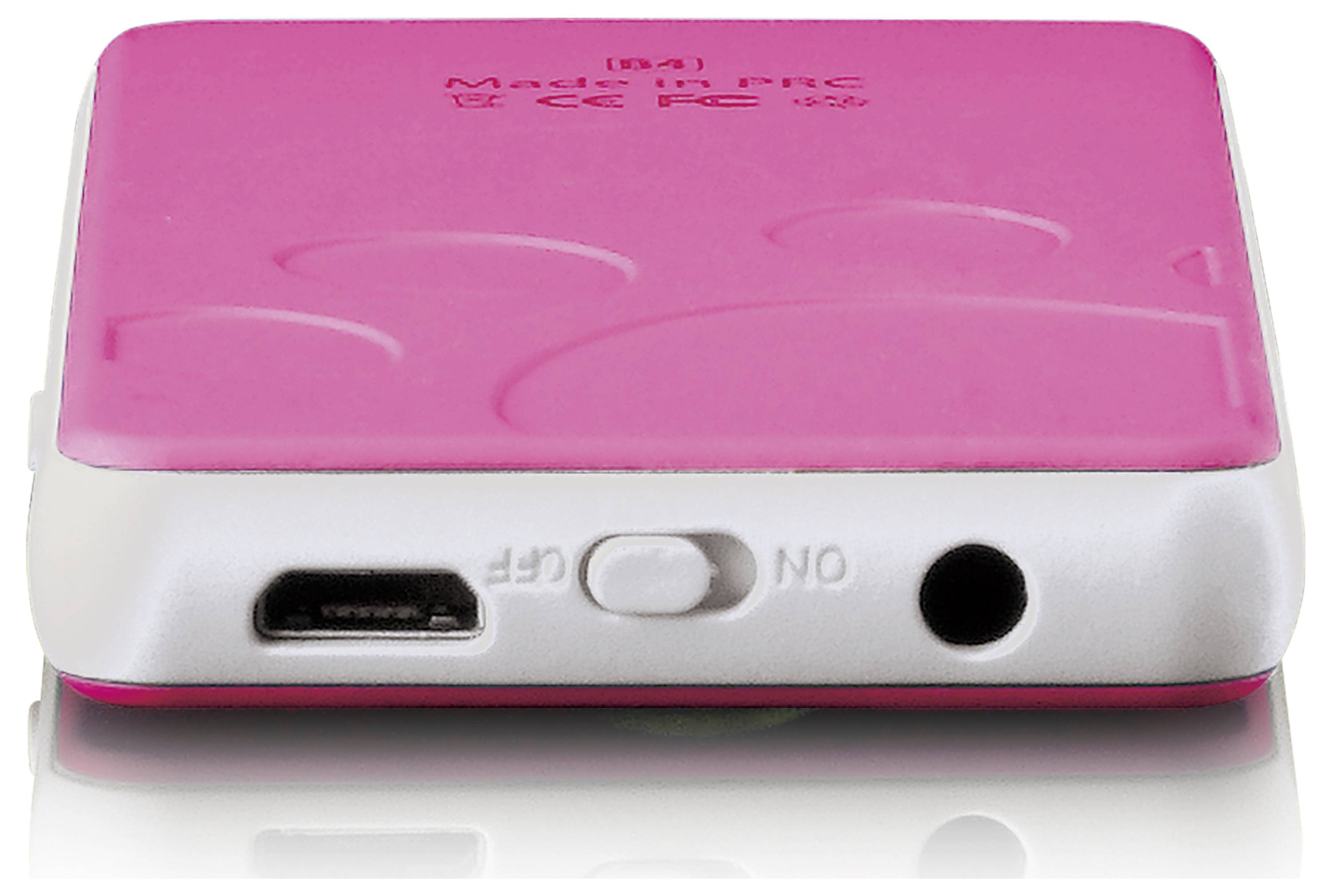Malé růžové elektronické zařízení s USB portem, konektorem pro sluchátka a vypínačem, umístěné na reflexní ploše.
