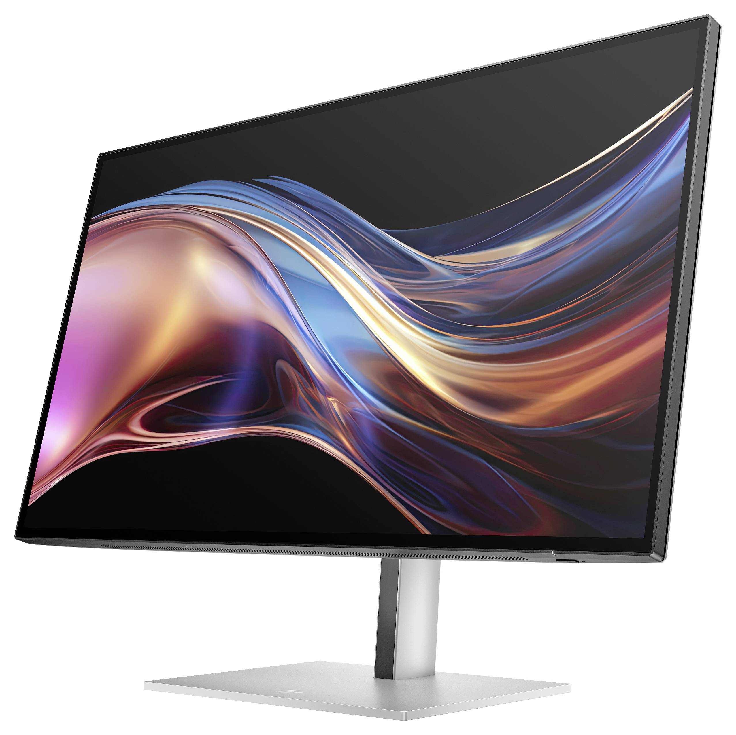 Moderní, široký počítačový monitor s lesklým displejem zobrazuje abstraktní barevné vlnovky. Design působí dynamicky a plynule.