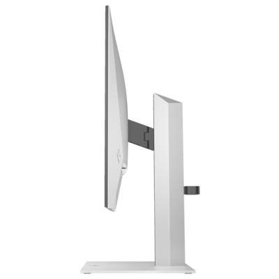 Bílý počítačový monitor z bočního pohledu ukazuje štíhlý design a nastavitelný stojan.