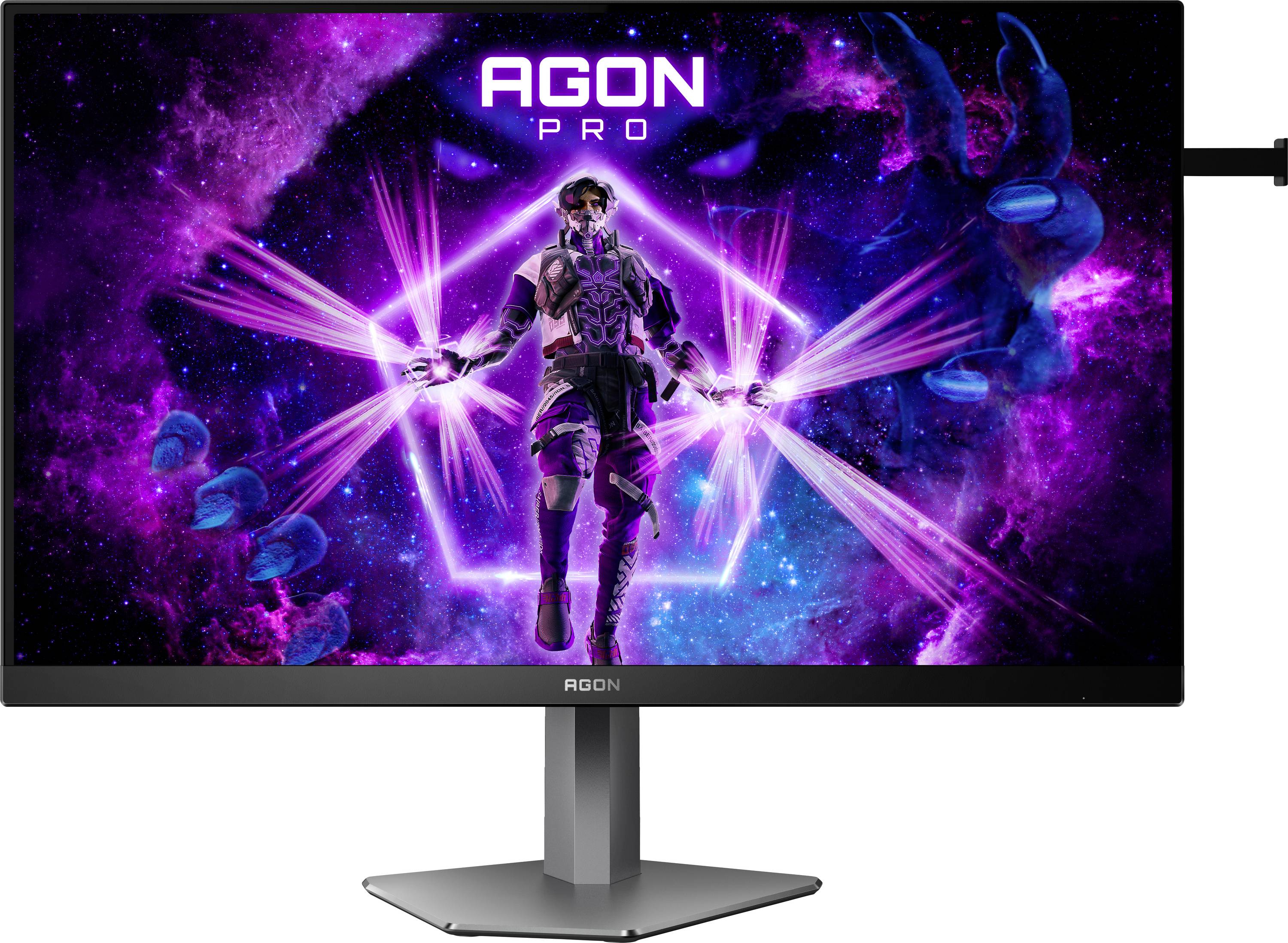 Herní monitor s barevným motivem science fiction na obrazovce. Text 'AGON PRO' svítí nad futuristickým vojákem ve vesmíru.