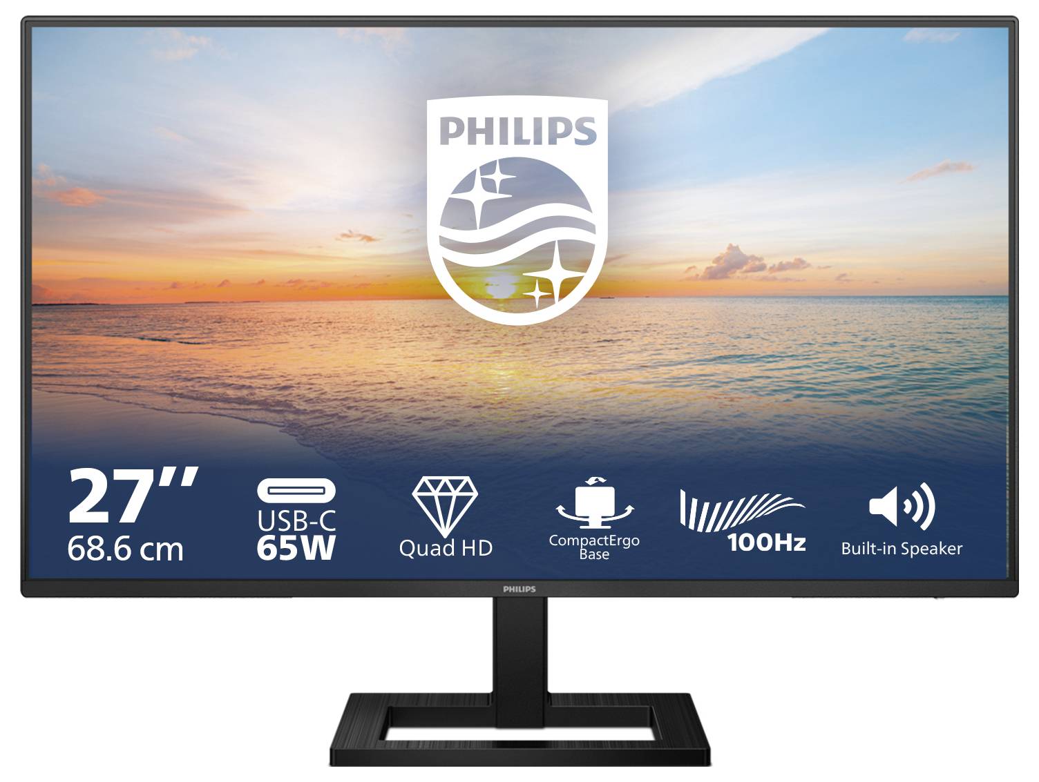 27palcový monitor Philips, USB-C, Quad HD, s integrovanými reproduktory, 100 Hz, zobrazený na pláži při západu slunce, s logem značky.