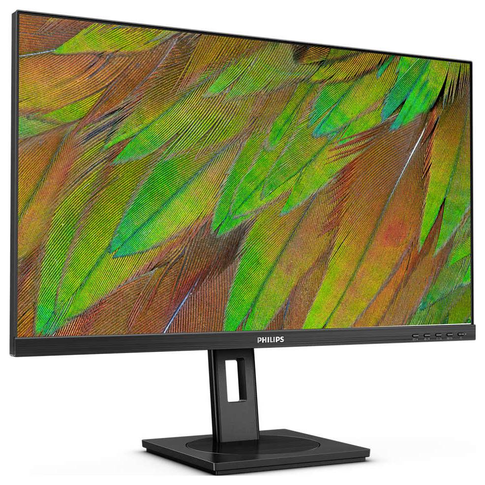 Počítačový monitor zobrazující živý vzor zelených a oranžových per.