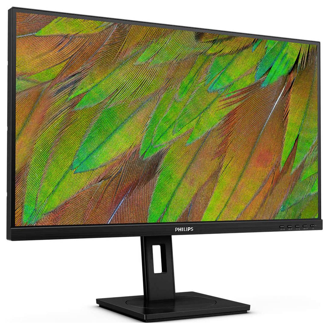 Monitor značky Philips zobrazuje detailní obrázek barevných ptačích per v zelených a oranžových tónech na obrazovce.