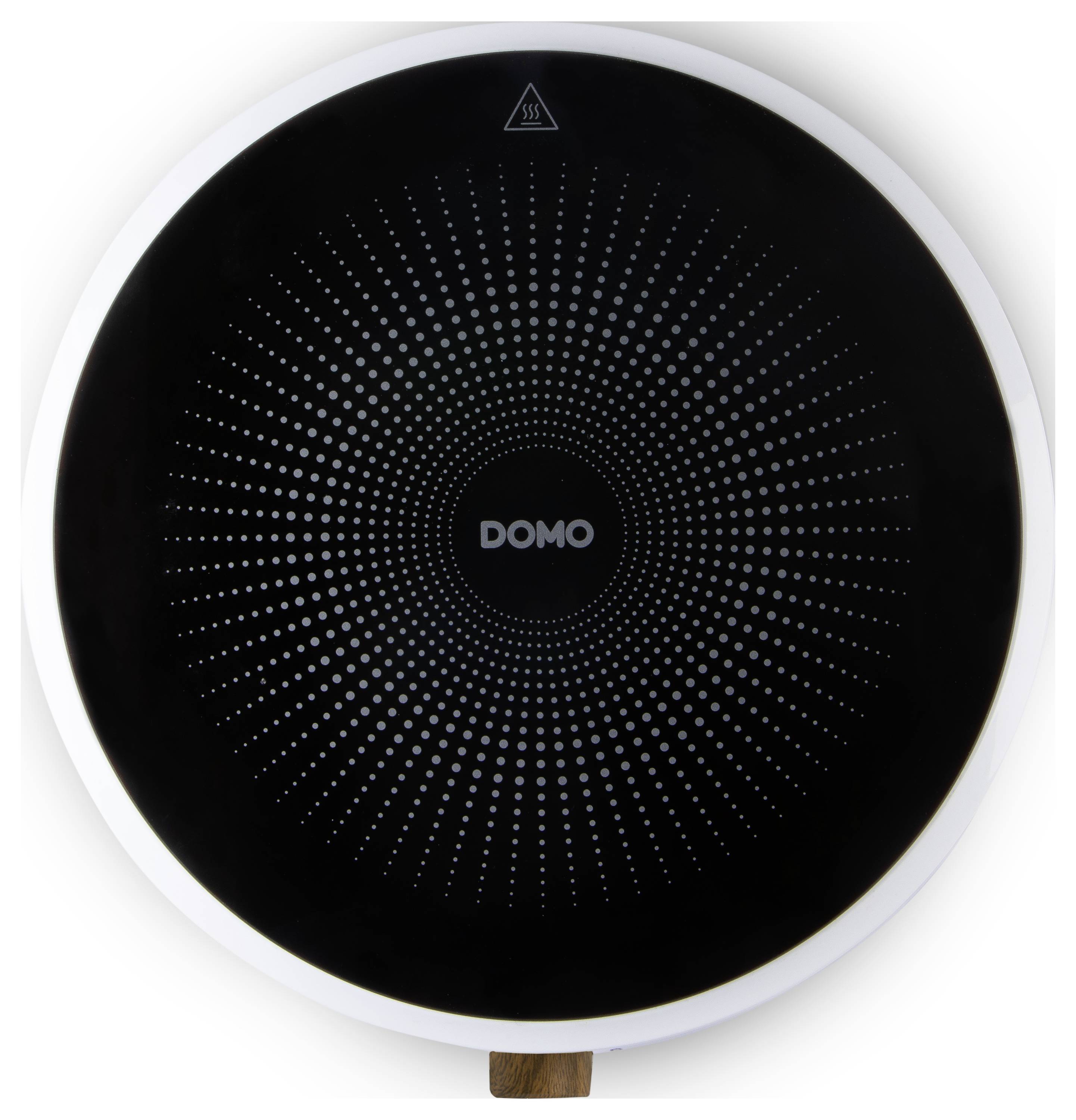 Kulatá černá elektrická varná deska od značky 'DOMO' s kruhovým vzorem a bílým lemováním.