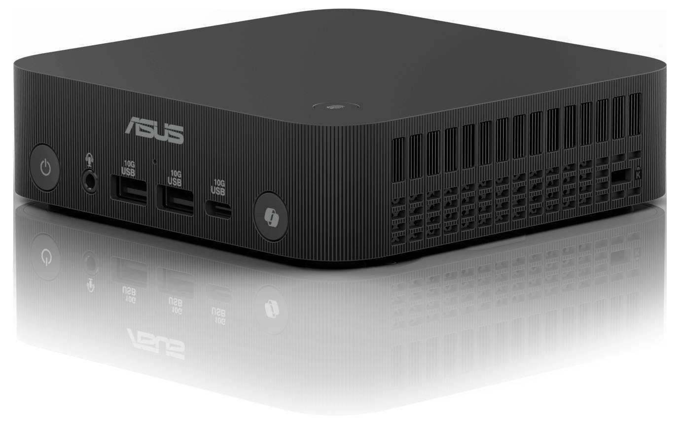 Černý mini počítač značky ASUS, pohled zepředu s několika USB porty a větracími otvory na straně.
