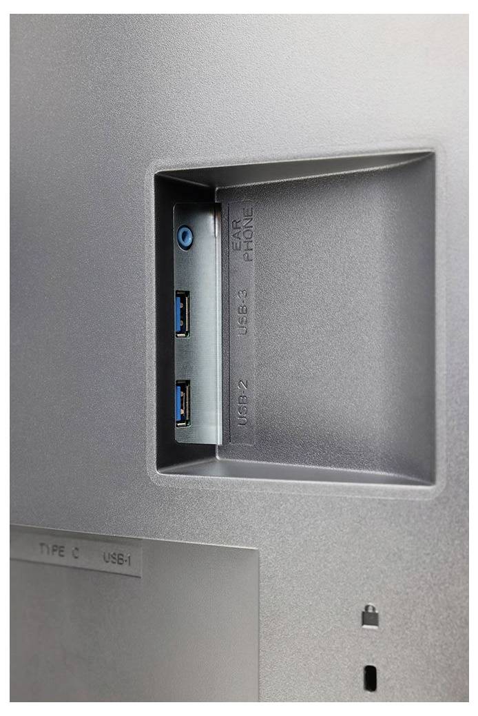 USB a sluchátkový port na zadní straně monitoru nebo zařízení. Dva USB porty, jeden vstup pro sluchátka.
