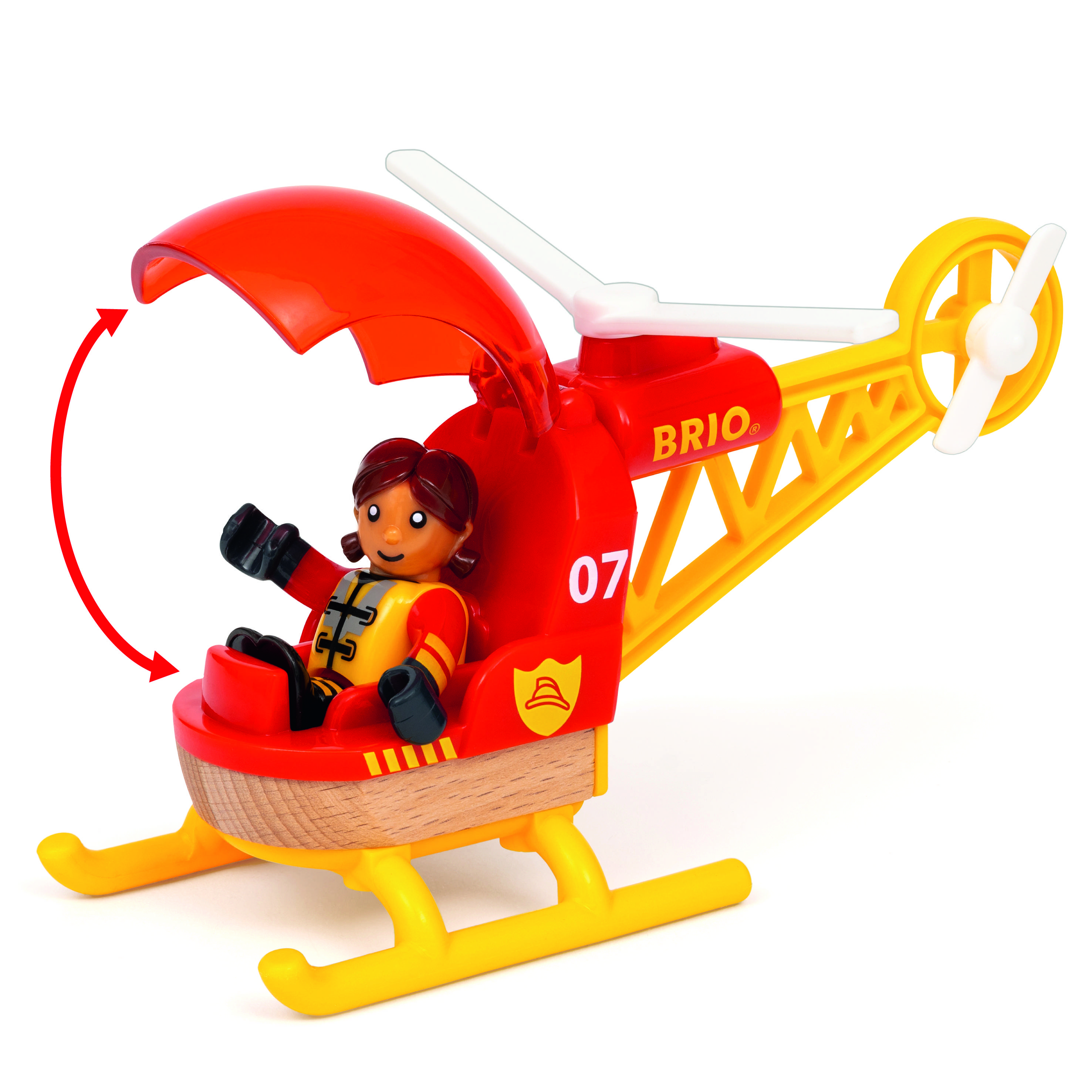 Plastový hračkářský vrtulník s červeným kokpitem a otočnými rotory, obsahuje pilotní figurku.