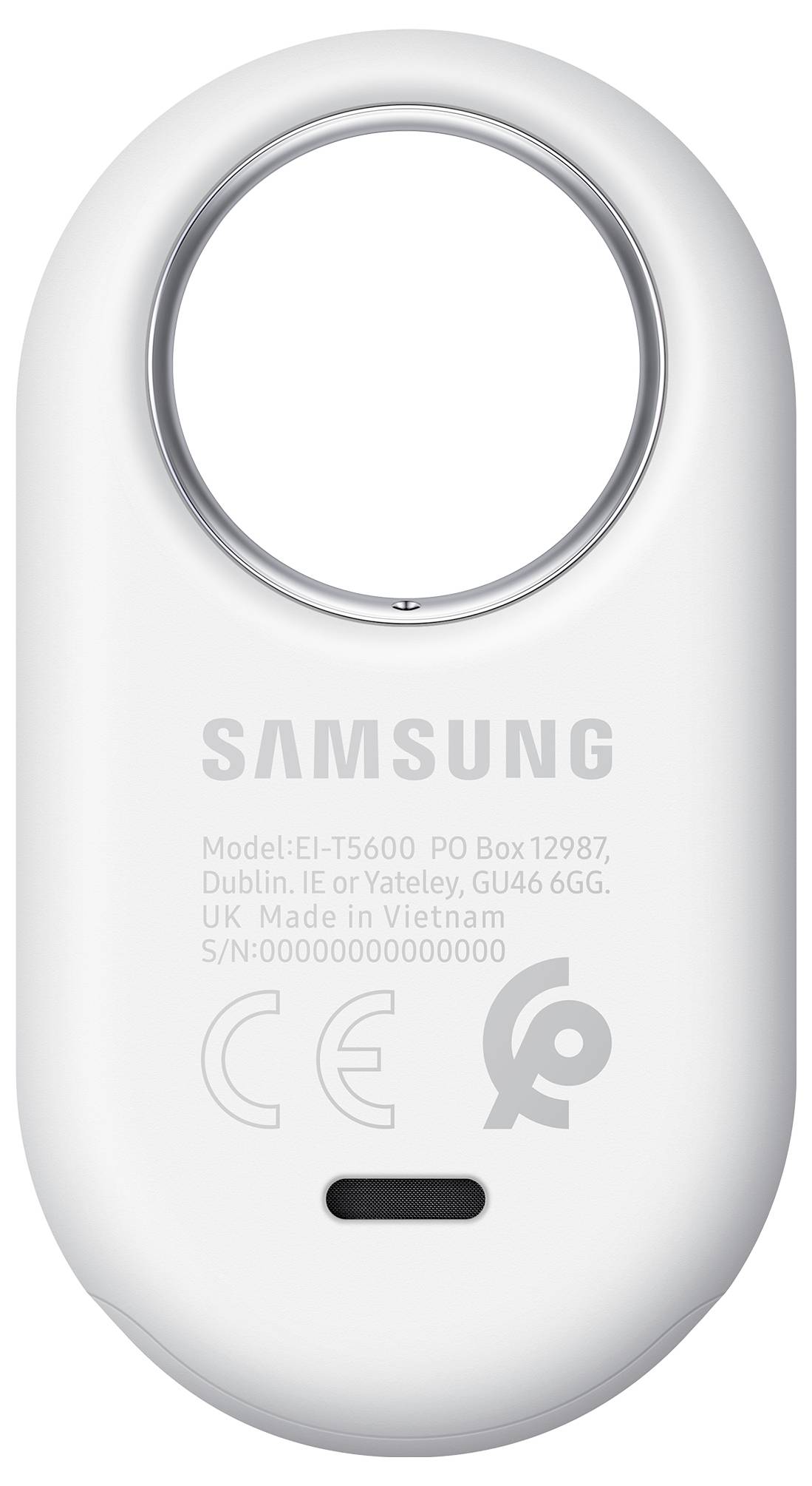 Sledovací zařízení s kruhovým horním krytem, na kterém je nápis „Samsung", na zadní straně zobrazující modelové číslo, kontaktní údaje a sériové číslo.