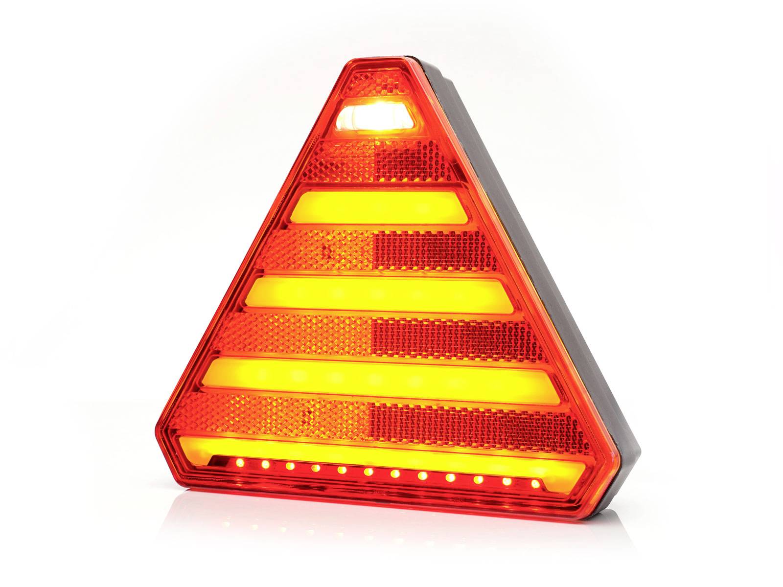 Červený a žlutý výstražný trojúhelník s reflexními prvky a LED světly, používaný k označení vozidel v nouzových situacích nebo při poruše.