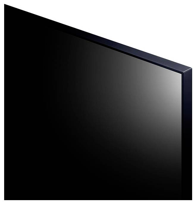 Detailní záběr moderní, černé, ploché televizní obrazovky s tenkou lištou, zobrazující horní pravý roh pod úhlem.