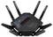 Černý Wi-Fi router s osmi anténami v futuristickém designu, zobrazující loga na povrchu, vhodný pro herní aplikace.