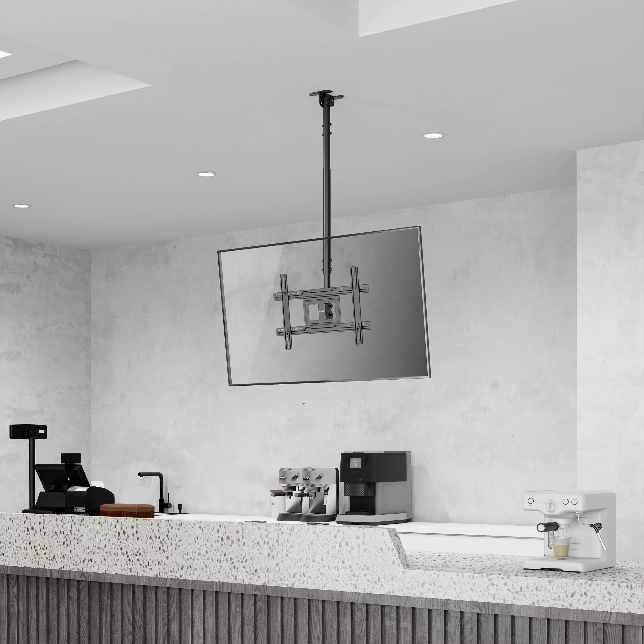 Moderní kavárový pult s pokladnou, espresso strojem a zavěšeným informačním panelem v minimalistickém designovém prostoru.