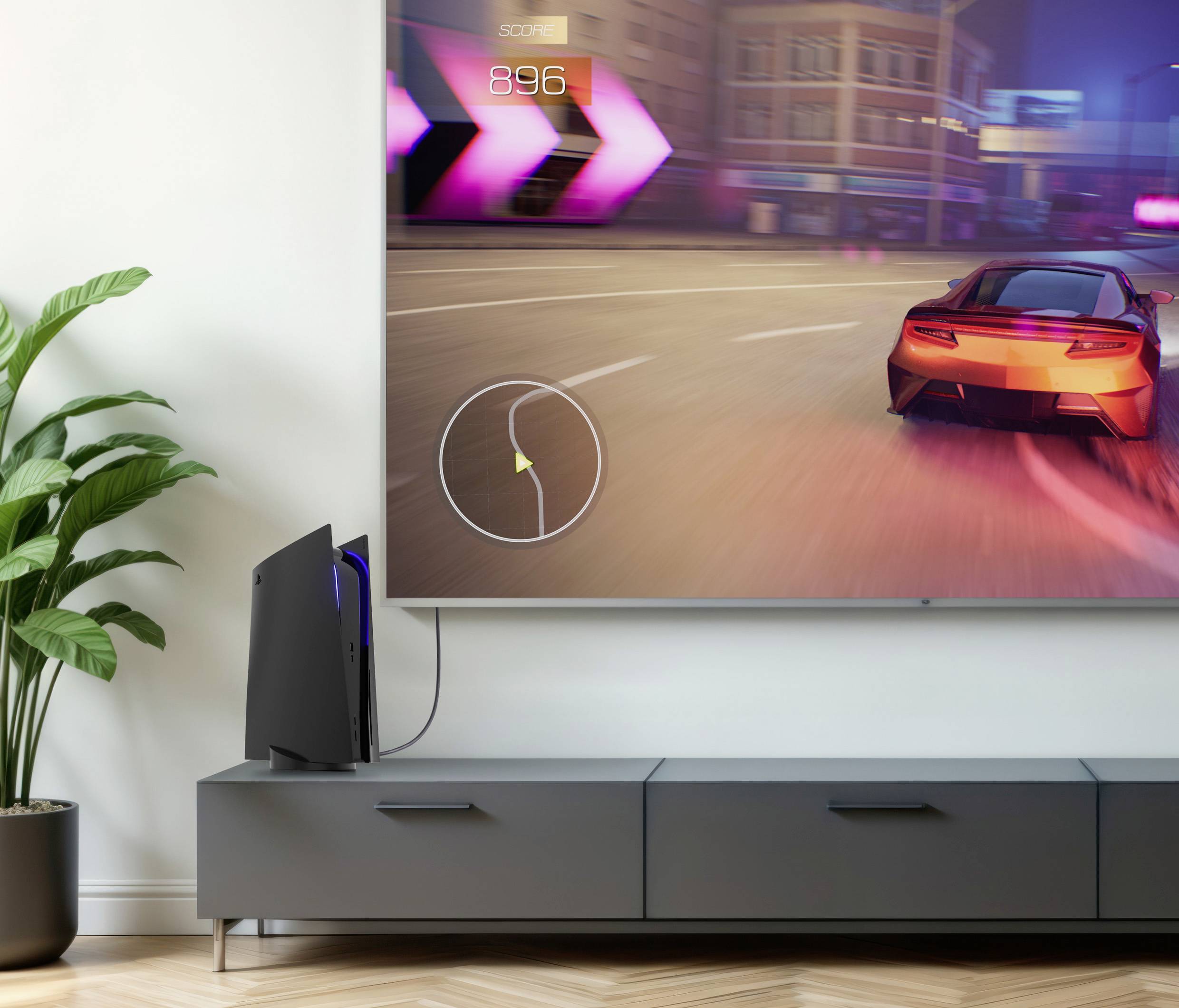 Elegantní, moderní herní sestava s velkkou obrazovkou TV, na které běží závodní hra. Herní konzole stojí vedle televize na minimalistickém stolku.