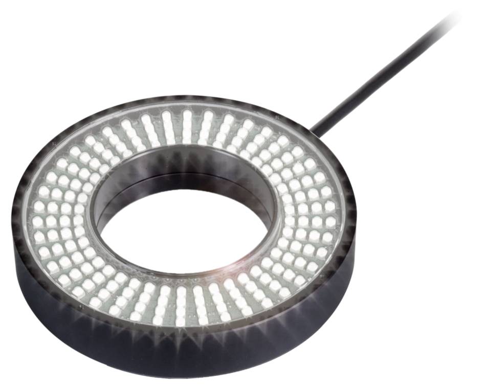 Kruhové LED světlo s mnoha malými, rovnoměrně rozmístěnými LED diodami. Je připojen kabel.