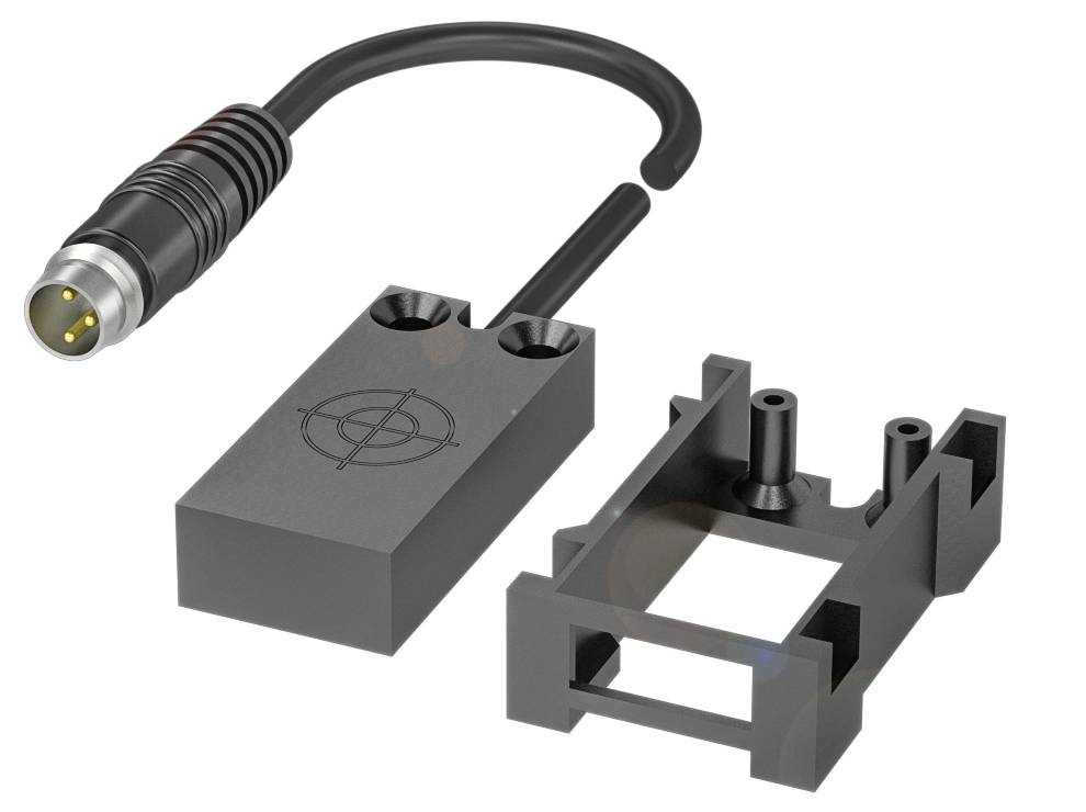 Obdélníkový senzor s kabelem, vedle něj odpovídající držák. Senzor má nahoře cílový vzor.