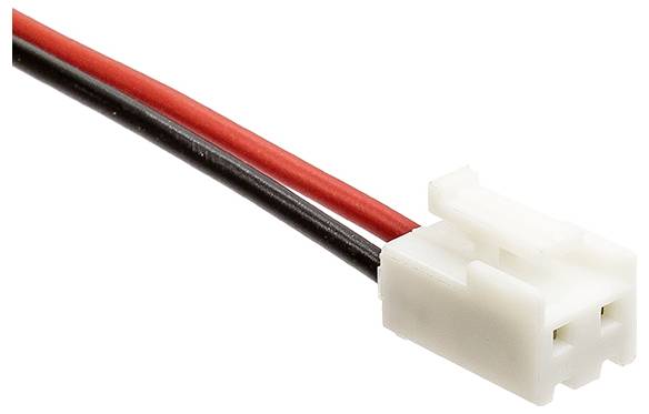 Detailní záběr dvoupólového konektoru s červeným a černým kabelem, typický pro elektronická spojení.